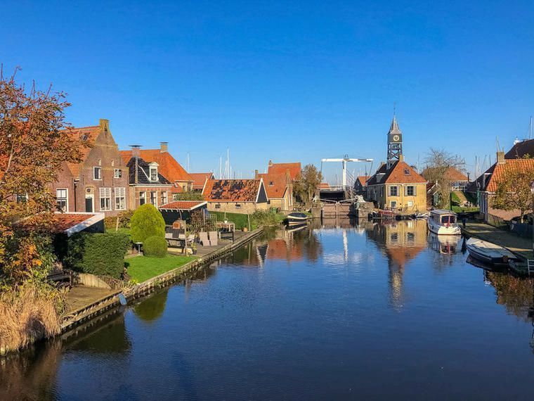 Canal in Hindeloopen during autumn holidays in Friesland, The Netherlands